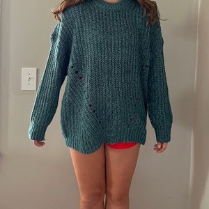 green sweater